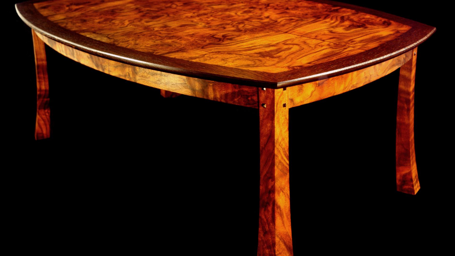 A Walnut Coffie Table With Flaired Legs by Don DeDobbeleer, Fine Custom Wood Furniture